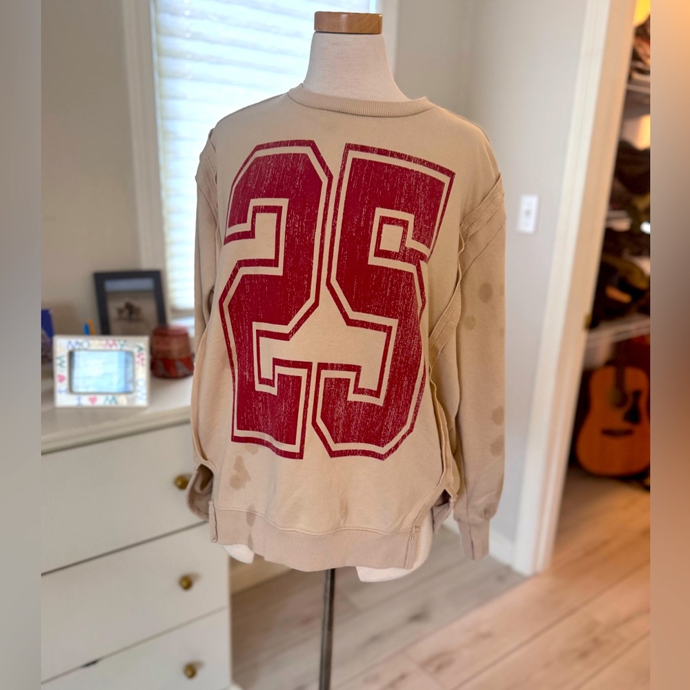 Goody Two sleeves Beige Sweater with Red 25 Graphic